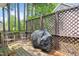 Outdoor deck with fenced-in patio with BBQ grill, ideal for entertaining at 901 N Taylor St, Wake Forest, NC 27587