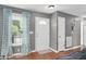 Welcoming entryway with a window, white front door, and neutral decor at 901 N Taylor St, Wake Forest, NC 27587