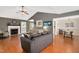 Spacious living room with hardwood floors, fireplace, and comfortable seating at 901 N Taylor St, Wake Forest, NC 27587