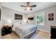 Cozy bedroom with natural light, neutral decor, and comfortable furnishings at 9220 Old Cascade Dr, Garner, NC 27529
