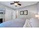 Bright bedroom featuring ample closet space, neutral paint, and comfortable carpet at 9220 Old Cascade Dr, Garner, NC 27529
