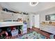 Alternate view of bedroom with playful decor, wood floors, storage, and view to hall at 9220 Old Cascade Dr, Garner, NC 27529