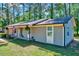 Charming single-story home with a well-maintained lawn and a welcoming front porch at 9220 Old Cascade Dr, Garner, NC 27529