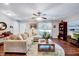 Comfortable living room with hardwood floors, ample seating, and bright, natural light at 9220 Old Cascade Dr, Garner, NC 27529