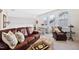 Bonus room featuring a leather sofa, a round wooden table, and neutral colored carpet at 94 Two Creeks, Chapel Hill, NC 27517