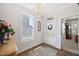 Bright entryway with chandelier and hardwood flooring at 94 Two Creeks, Chapel Hill, NC 27517