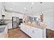 Open kitchen layout with a large center island, stainless steel appliances, and easy access to living spaces at 94 Two Creeks, Chapel Hill, NC 27517