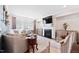 Cozy living room with a fireplace, comfortable seating, and a bright, inviting ambiance at 94 Two Creeks, Chapel Hill, NC 27517