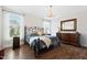 This room offers a calming color palette, a wrought iron bed, and lots of natural light at 94 Two Creeks, Chapel Hill, NC 27517