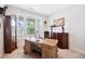 Stylish office with large window, custom desk, and elegant decor at 94 Two Creeks, Chapel Hill, NC 27517