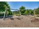 Community playground featuring swings and climbing equipment for outdoor recreation and Gathering fun at 94 Two Creeks, Chapel Hill, NC 27517