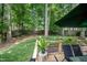 Enjoy the outdoors on this wood deck overlooking the lovely grass and landscaped backyard at 9408 Bells Valley Dr, Raleigh, NC 27617