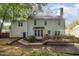 Back of the house showcasing the wood deck, siding and roof at 9408 Bells Valley Dr, Raleigh, NC 27617