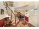 Inviting foyer with hardwood floors, staircase, and dining room view, creating a warm entry at 9408 Bells Valley Dr, Raleigh, NC 27617