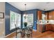 Breakfast nook with large windows and hardwood floors at 9517 Candor Oaks Dr, Raleigh, NC 27615