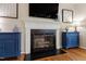 Living room with fireplace and built-in cabinets at 9517 Candor Oaks Dr, Raleigh, NC 27615