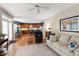 Open concept living room and kitchen with hardwood floors at 9517 Candor Oaks Dr, Raleigh, NC 27615