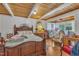 A traditional bedroom with a wooden ceiling, and a beautifully decorated interior at 1003 W Divine St, Dunn, NC 28334