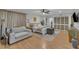 Bedroom featuring a seating area, hardwood floors, and good natural lighting at 1003 W Divine St, Dunn, NC 28334