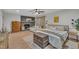 A comfortable bedroom with a fireplace, hardwood floors, and sitting area at 1003 W Divine St, Dunn, NC 28334