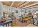 Dining room featuring wood ceiling, wood table, and custom windows at 1003 W Divine St, Dunn, NC 28334