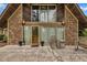 Charming home exterior with stone facade and welcoming front porch at 1003 W Divine St, Dunn, NC 28334