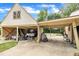 Open garage filled with various items, offering ample storage and workspace potential at 1003 W Divine St, Dunn, NC 28334