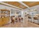 Inviting living room featuring wood floors, decorative accents, and an open layout to the kitchen at 1003 W Divine St, Dunn, NC 28334