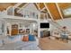 Bright living room featuring wood ceilings, wood floors, and stylish furnishings at 1003 W Divine St, Dunn, NC 28334