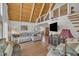 Inviting living room with vaulted ceilings, hardwood floors, and ample natural light at 1003 W Divine St, Dunn, NC 28334