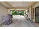 Covered patio with outdoor furniture, providing a comfortable and shaded outdoor living space at 1003 W Divine St, Dunn, NC 28334
