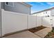 Fenced backyard featuring a patio and minimal plants at 1027 Myers Point Dr, Morrisville, NC 27560