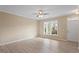 Bright living room with hardwood floors, natural light, and neutral walls at 1027 Myers Point Dr, Morrisville, NC 27560