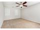Bedroom with neutral walls, carpet flooring, and ceiling fan at 105 Hiddenwood Ct, Garner, NC 27529