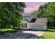 Charming two-story home with a two-car garage and lush greenery in a well-maintained neighborhood at 105 Hiddenwood Ct, Garner, NC 27529