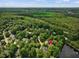 Discover this home near Stevens Nature Center, with beautiful trees, a pond, and neighborhood views from above at 105 Highlands Lake Dr, Cary, NC 27518