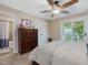 A bedroom with a ceiling fan at 105 Highlands Lake Dr, Cary, NC 27518