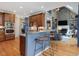 Well-appointed kitchen featuring stainless steel appliances and a breakfast bar at 105 Highlands Lake Dr, Cary, NC 27518