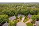 An aerial view showcasing the homes nestled among lush trees in this quiet neighborhood at 108 Nimbus Ct, Cary, NC 27513