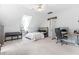 Bedroom features a bed, ceiling fan, window, desk, neutral carpet, and attached workspace at 108 Nimbus Ct, Cary, NC 27513