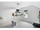 Bedroom featuring a ceiling fan, window, work space, and neutral carpet at 108 Nimbus Ct, Cary, NC 27513
