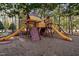 A colorful community playground with multiple slides and climbing features at 108 Nimbus Ct, Cary, NC 27513