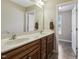 Bathroom with double vanity, hard surface counter top, and tile flooring at 109 Lyngrove St, Holly Springs, NC 27540