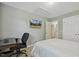 Bedroom with ceiling fan, access to another room, and space for a desk and bed at 109 Lyngrove St, Holly Springs, NC 27540
