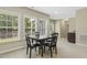 Dinette with large windows and a table, four chairs is perfect for Gathering gatherings or entertaining guests at 109 Lyngrove St, Holly Springs, NC 27540