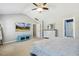 Comfortable main bedroom offering ample space, including a large TV for entertainment at 109 Lyngrove St, Holly Springs, NC 27540
