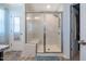 Modern bathroom features a glass shower with a built-in seat at 1101 Compass Dr, Durham, NC 27713