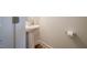 This powder room offers a functional space with a pedestal sink, modern faucet, and neatly placed towel ring at 1101 Compass Dr, Durham, NC 27713