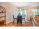 Cozy dining area with a glass table and modern chandelier at 1101 Compass Dr, Durham, NC 27713