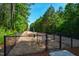 The community dog park features a fenced enclosure with play equipment and ample space for your pets to roam at 1101 Compass Dr, Durham, NC 27713